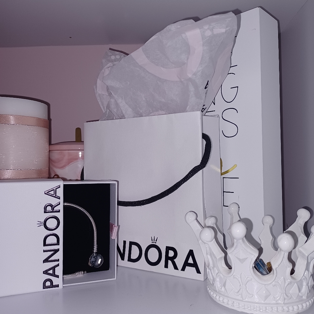 Pandora bracelet with box, bag, and tissue paper included. Silver 6.7 size